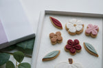 Close up of flower and leaves decorated cookies