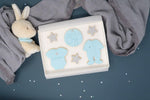It's a boy cookie set, grey stars, blue vest and blue baby grow