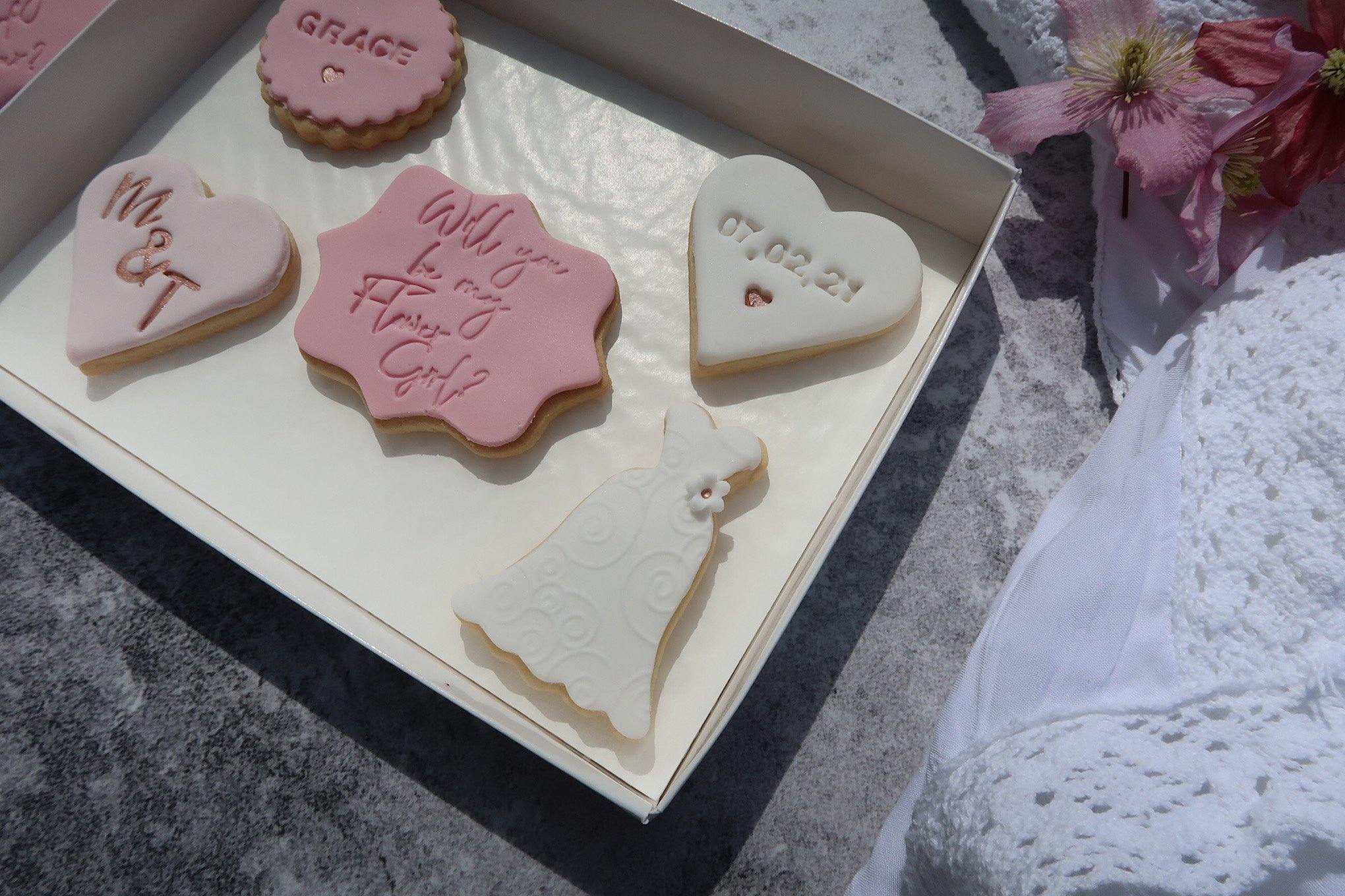 Will you be my flower girl cookies, wedding date on heart, bride and groom initials on heart cookie, recipients name on circle cookie, wedding dress cookie.  white, rose gold and pink